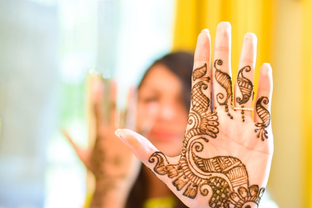 Henna tattoo motif on arm - a Royalty Free Stock Photo from Photocase